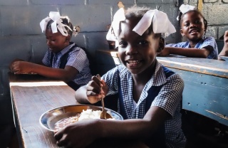 Girl in school in Haiti