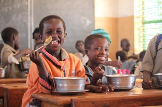 children in Benin receiving Mary's Meals