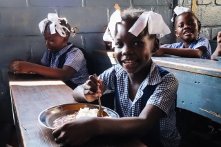 Girl in school in Haiti