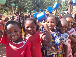 Children waiting for Mary's Meals in Mozambique